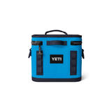 Yeti Hopper Flip 8 Personal Cooler - A blue cooler with a handle on top and an orange logo that says "YETI" in bold letters.