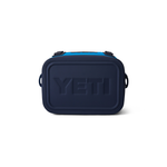Yeti Hopper Flip 8 Personal Cooler - A navy blue cooler with a black handle and zipper, featuring an embossed "YETI" logo on one side.