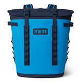 Yeti Hopper M20 Soft Backpack Cooler - A large, blue cooler with a zippered top and two adjustable shoulder straps.
