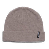 Stance Icon 2 Beanie 2024 - A light gray beanie with a small black tag on the front that says "STANCE" in white letters.