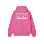 Union Team Hoodie 2026 - A pink hoodie with a white logo on the chest and a hood.