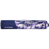 Dakine Team Low Roller Snowboard Bag 2025 - A navy blue snowboard bag with a white logo and straps on the side.
