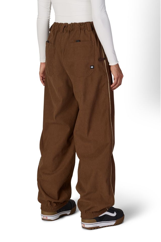 Brown wide-leg shell pants with elastic back waistband and ankle cuffs