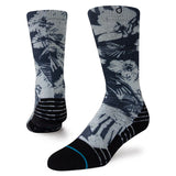 Tropic Chill Kids Sb Sock 2022 - A pair of gray socks with a tropical print featuring palm trees and hibiscus flowers.