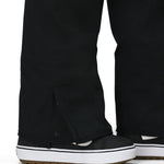 Black cargo pants with cuffed hem and deep side pocket opening detail