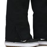 Black cargo pants with cuffed hem and deep side pocket opening detail