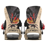Union Atlas Pro Kazu Snowboard Binding - A black snowboard binding with a red strap and silver screws, featuring a large eagle graphic on top of a yellow flame design.
