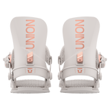 Union Women's Juliet Snowboard Binding - A light gray snowboard binding with rose gold buckles and straps, featuring a sleek design with a subtle pattern on the baseplate.