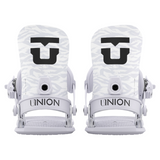 Union Women's Legacy Snowboard Binding 2026 - A pair of white snowboard bindings with a black logo on top, featuring a textured pattern and a circular hole in the center.