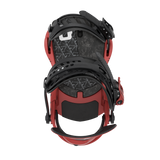 Red snowboard binding with black highback and ankle straps, rear view