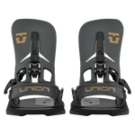 Pair of men's Step On snowboard bindings in dark color with gold high back logos