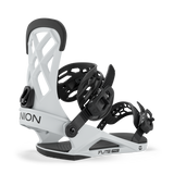 Men's snowboard binding in white with black straps, side view showing highback and base.