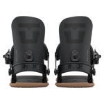 Pair of women’s snowboard bindings in black, front view with two highbacks and strap cushions