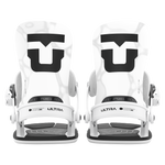 Pair of white snowboard bindings, front view, with black soles and straps