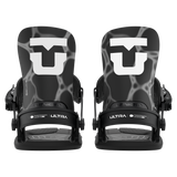 Pair of black women's snowboard bindings, front view with high-backs and straps.