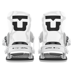 Pair of white women's snowboard bindings, front view with high-backs and straps.