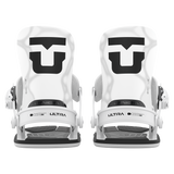 Pair of white women's snowboard bindings, front view with high-backs and straps.
