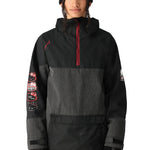 The 686 Upton Insulated Anorak Jacket 2025 has an insulated hood and is black with a red zipper.