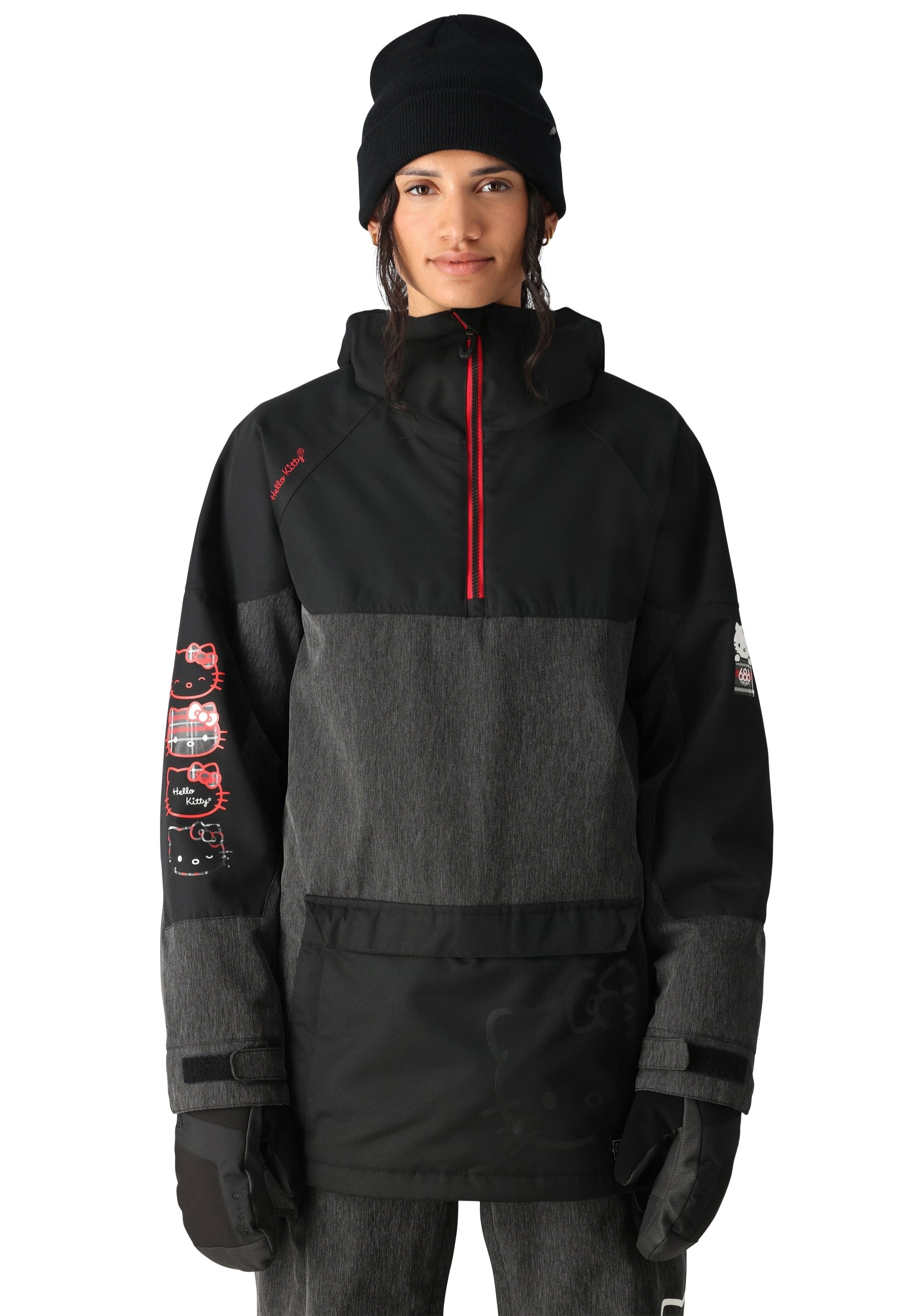 The 686 Upton Insulated Anorak Jacket 2025 has an insulated hood and is black with a red zipper.