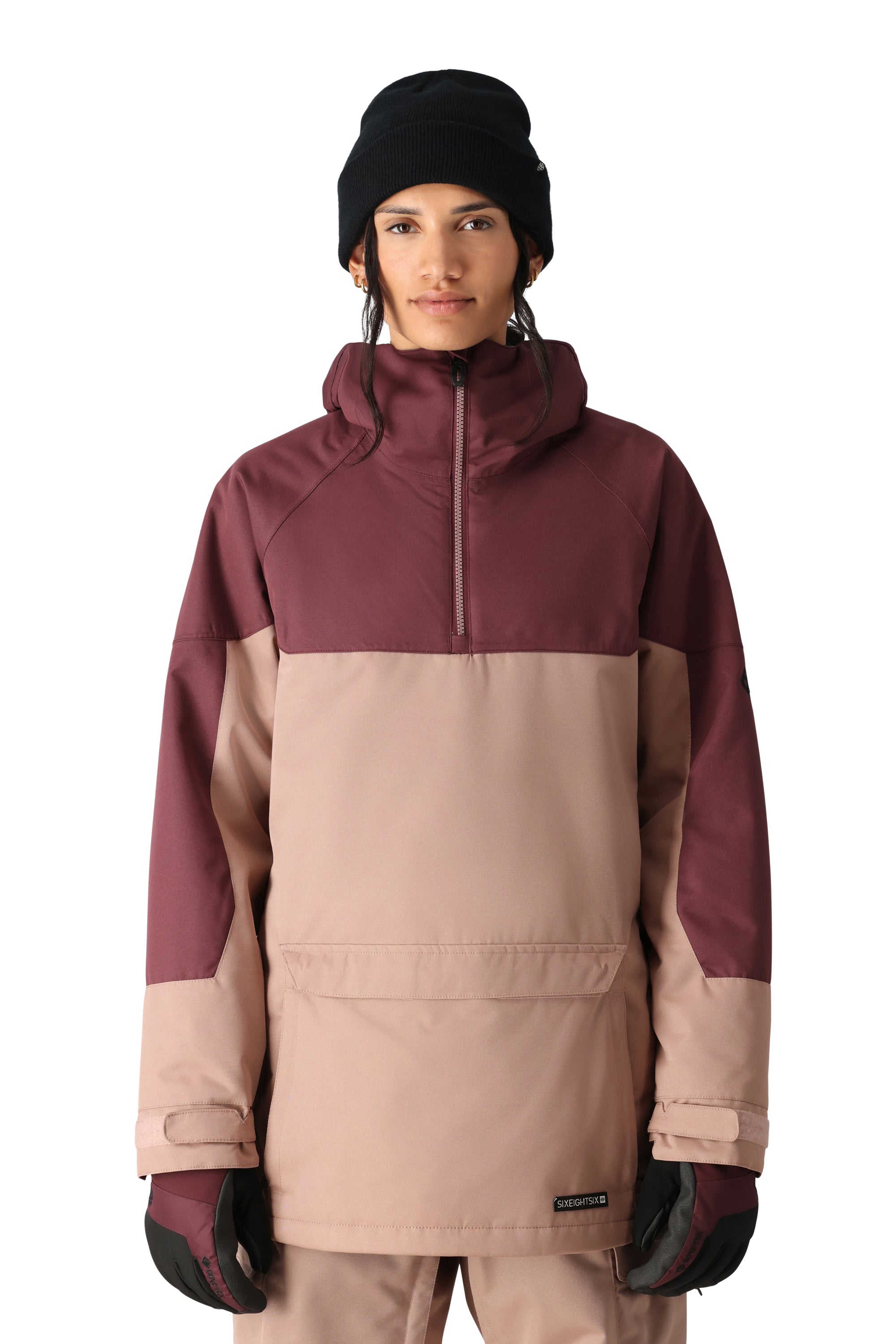 The 686 Women's Upton Insulated Anorak Jacket 2025 is shown from the front view in a color block design with maroon and tan sections.