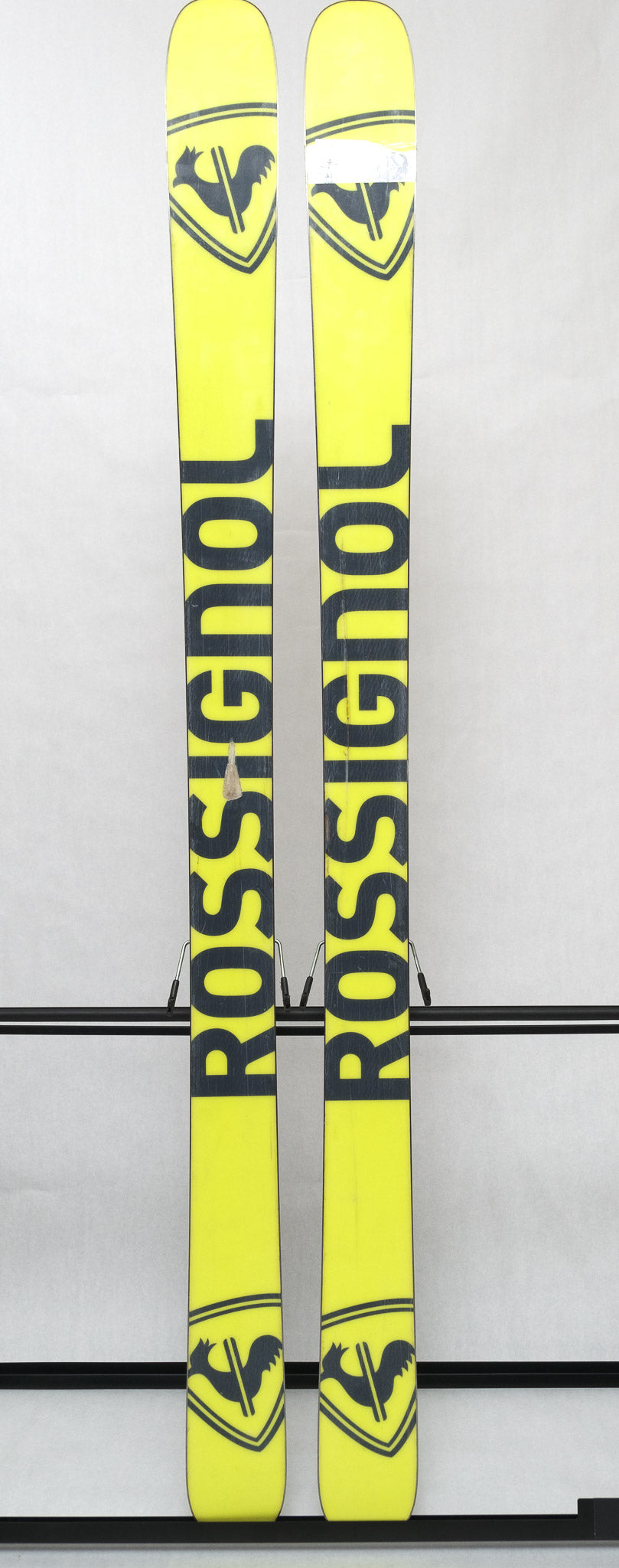 USED - Rossignol Black Ops Sender Ti with Pivot 14 Bindings - A pair of skis featuring a sleek black finish and distinctive pivot bindings.