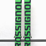 USED - Rossignol Black Ops Holyshred with SPX12 Bindings - A pair of skis with a black and green color scheme, featuring a distinctive rooster logo on the top sheet.
