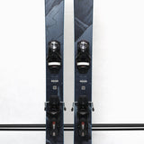 USED - Rossignol Blackops 98 with SPX 12 Demo Bindings - A pair of skis with a black and white marbled pattern on the tops, featuring a distinctive "Blackops" logo in silver.