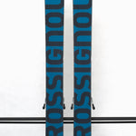 USED - Rossignol Blackops 98 with SPX 12 Demo Bindings - A pair of skis featuring a black base color and silver lettering, with two bindings attached to the top.