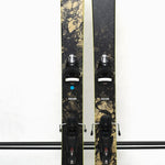 USED - Rossignol Black Ops Sender Ti with SPX 12 Bindings - A black ski with a yellow sticker on its tip and silver bindings.