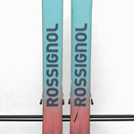 USED - The skis are light blue with a darker blue logo and lettering.