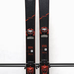 USED - Head Kore 99 with Attack 14 Bindings - A pair of black skis with red bindings and a white tag on the left ski.