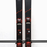 USED - Head Kore 99 with Attack 14 Bindings - A pair of black skis with red bindings and a white tag on the left ski.