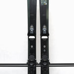 USED - Salomon Stance 90 2022 with STH13 Bindings - A pair of skis and bindings, featuring a dark gray color scheme with white lettering on the Salomon logo.