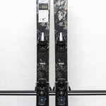 USED - Rossignol Black Ops Escaper with AM 12 Bindings - A pair of skis with a black and white marbled pattern, featuring silver bindings.