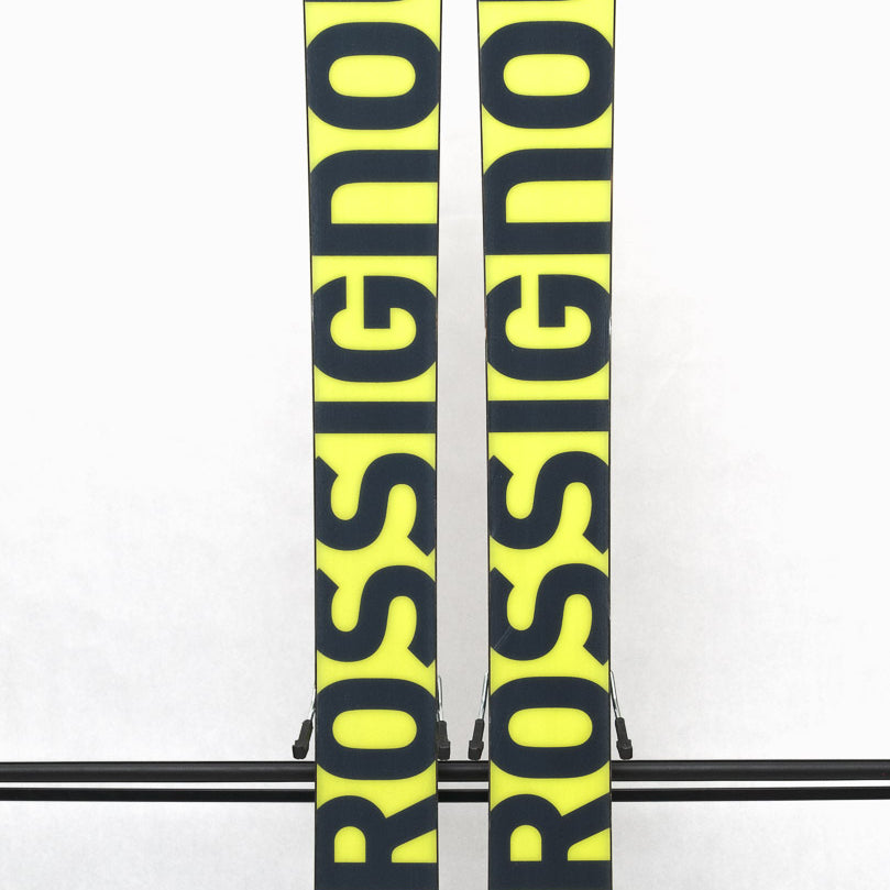 USED - Rossignol Sender 106 Ti+ 2024 with SPX12 Demo Bindings - A pair of skis with a yellow base and black lettering, featuring the Rossignol logo on the top.