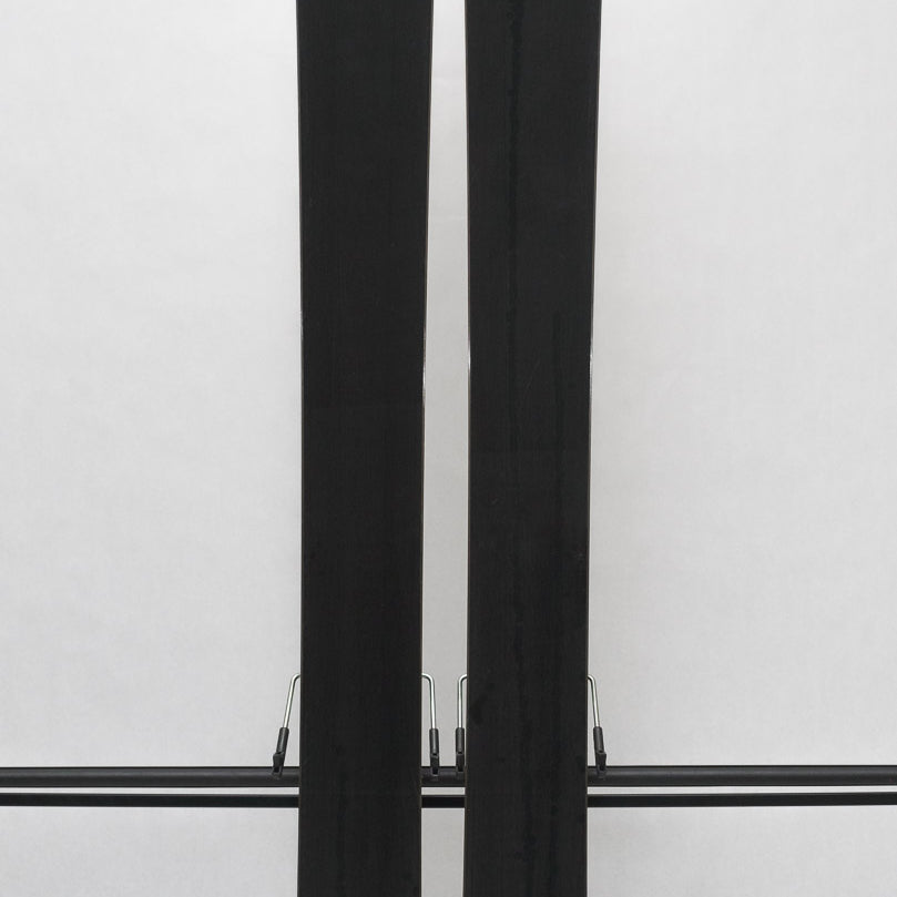 USED - Rossignol Black Ops Sender Ti with Pivot 12 Bindings - A pair of skis featuring a sleek black finish and silver bindings.