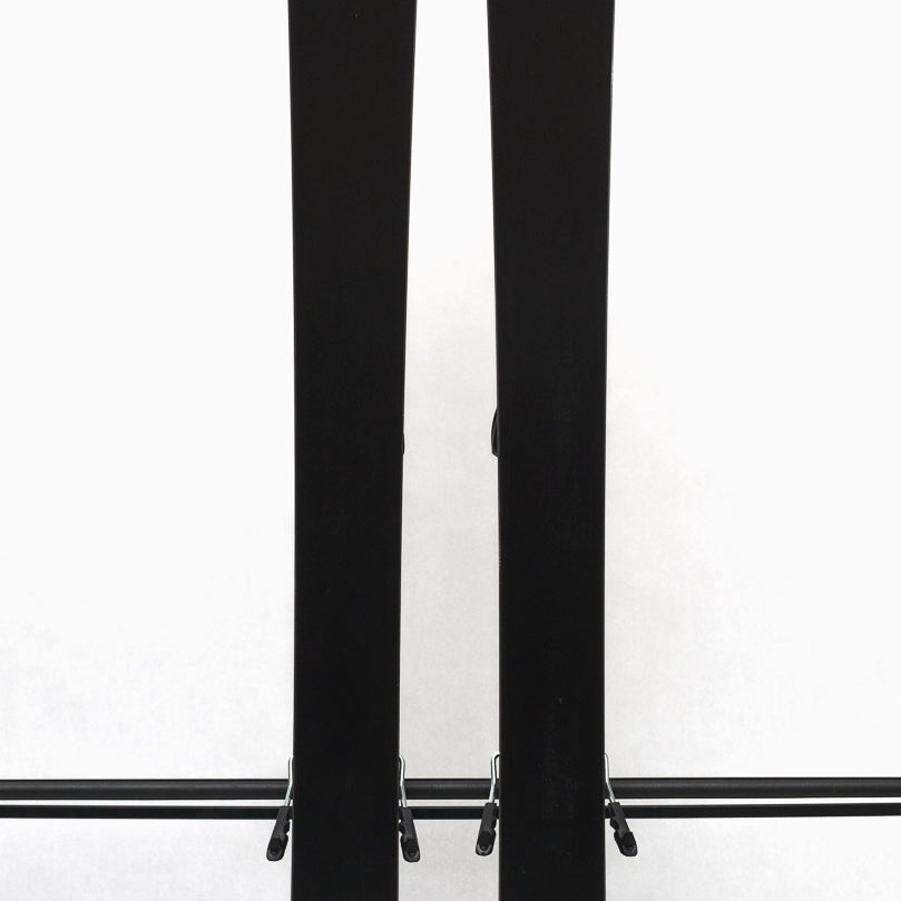 USED - Salomon Stance 90 2022 with Warden 13 Bindings - A pair of skis with a black base and white lettering, featuring the Salomon logo on the top.