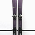 USED - Blizzard Brahma 88 with Griffon 13 Bindings - A pair of skis with a purple base and white lettering, featuring a distinctive bull logo on the top sheet.
