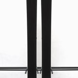 USED - Blizzard Brahma 88 with Griffon 13 Bindings - A pair of skis featuring a black base with white lettering and a distinctive logo on top, accompanied by two bindings.