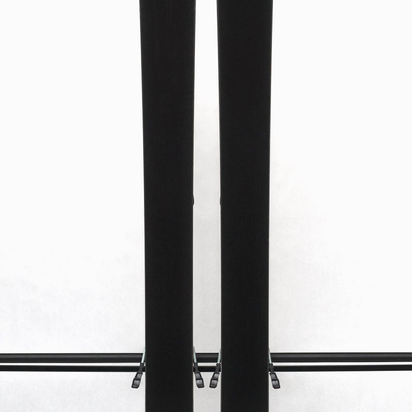 USED - Blizzard Brahma 88 with Griffon 13 Bindings - A pair of skis featuring a black base with white lettering and a distinctive logo on top, accompanied by two bindings.