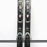 USED - Rossignol Black Ops Escaper with Pivot 12 Bindings - A pair of skis featuring a black and white marbled pattern on the tops, with silver bindings.