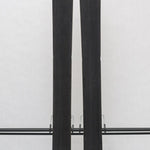 USED - Rossignol Black Ops Escaper with Pivot 12 Bindings - A pair of skis featuring a black base and white tops, with a distinctive logo on top.