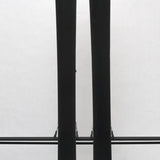 USED - Rossignol Experience 86Ti with SPX12 Bindings - A pair of skis with a white top and black bottom, featuring a distinctive "Rossignol" logo on the tip.