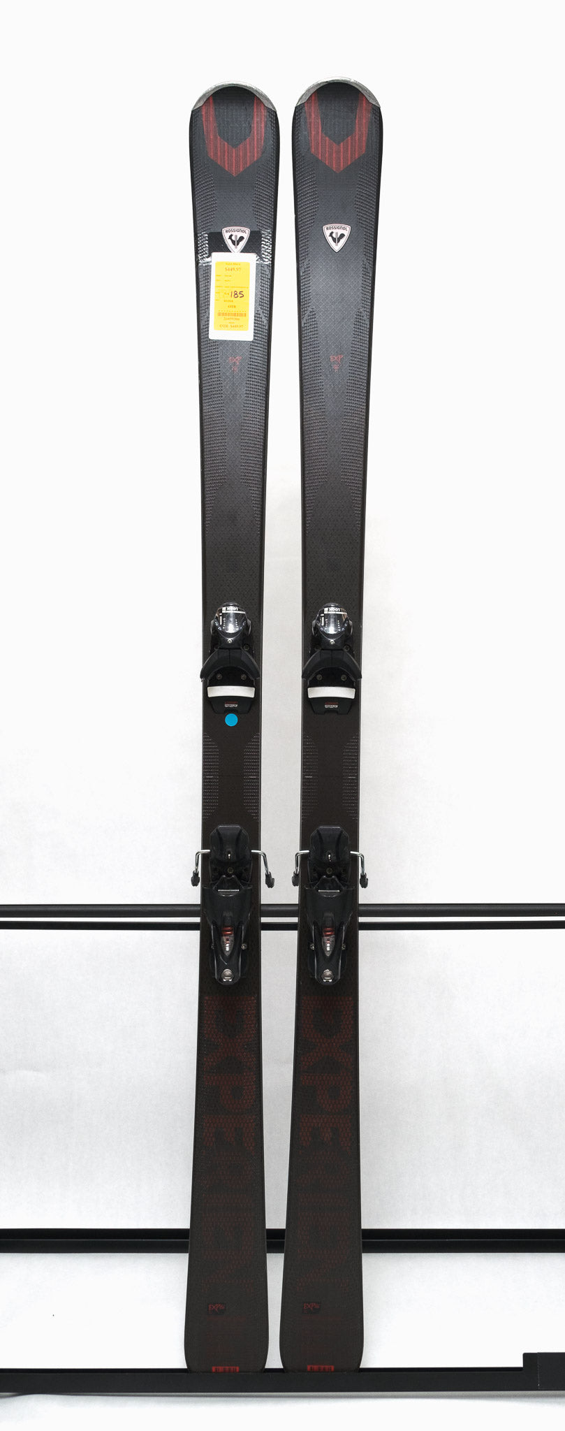 USED - Rossignol Experience 86Ti with SPX12 - A pair of skis featuring a black base with red accents and silver bindings.