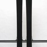 USED - Rossignol Arcade 84 with SPX 12 Demo Bindings - A pair of skis featuring a yellow and black color scheme, with a distinctive rooster logo on the top of each ski.