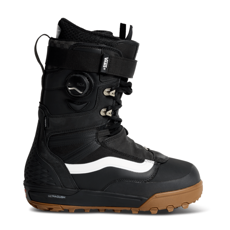 Black/white snowboard boot with BOA dial and ankle strap, lace-up.