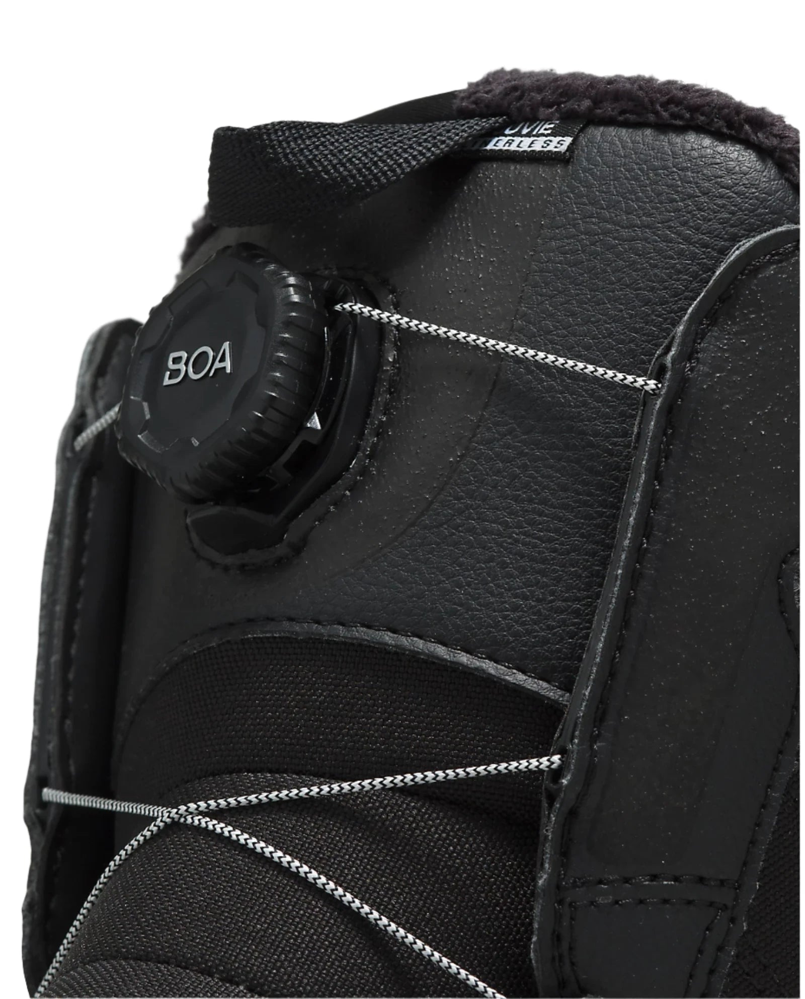 Vans Junior's Juvie Linerless Snowboard Boot 2025 - Black snowboard boot with white logo on side and black laces.