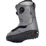 Vans Men's Aura Pro Snowboard Boot 2025 - A gray snowboard boot with a black strap and white lettering on the side.