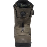 Vans Men's Verse x Parker Szumowski Snowboard Boot 2025 - A dark brown snowboard boot with a black strap and buckle on the side.