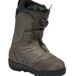 Vans Men's Verse x Parker Szumowski Snowboard Boot 2025 - A dark brown snowboard boot with a black strap and buckle on the side, set against a white background.